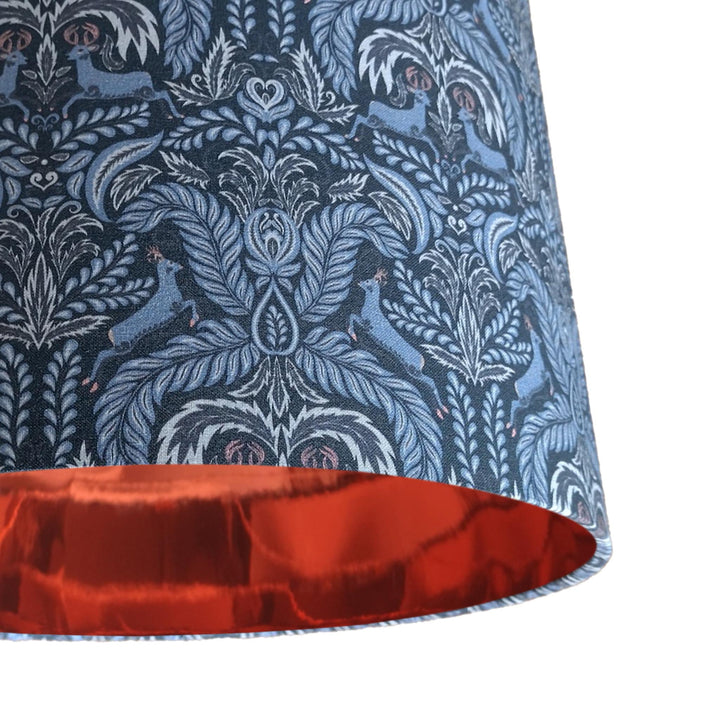 close up of the Deer Woodland Cotton Lampshade in Navy Blue with Mirror Copper