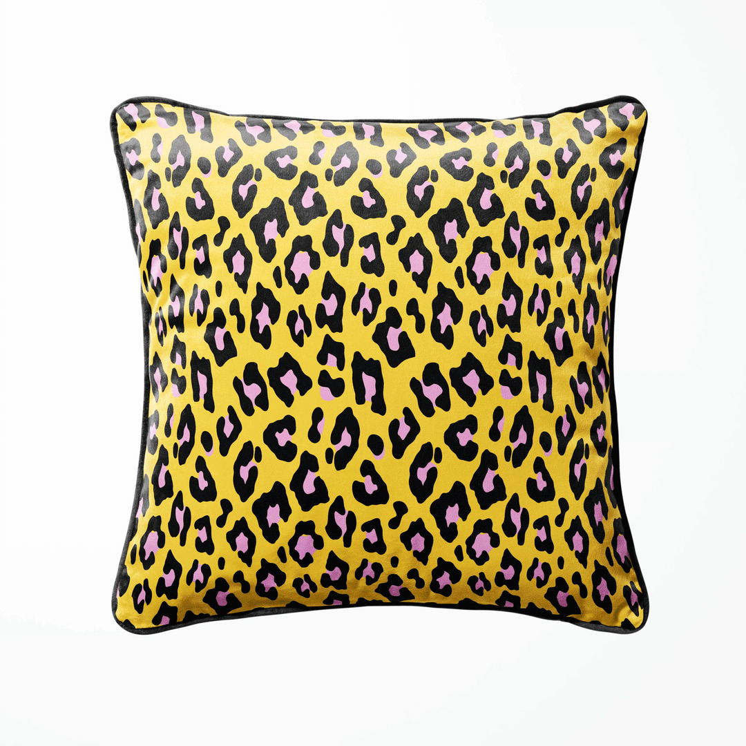 leopard velvet cushion in pink with animal print and piping