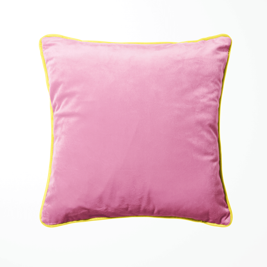 velvet animal print cushion with gold piping pink green