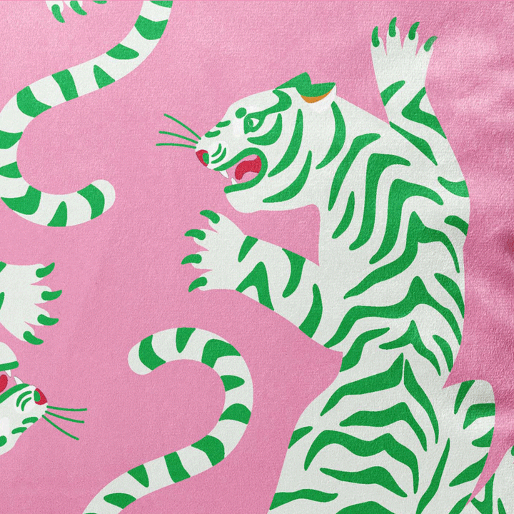 velvet animal print cushion with gold piping pink green